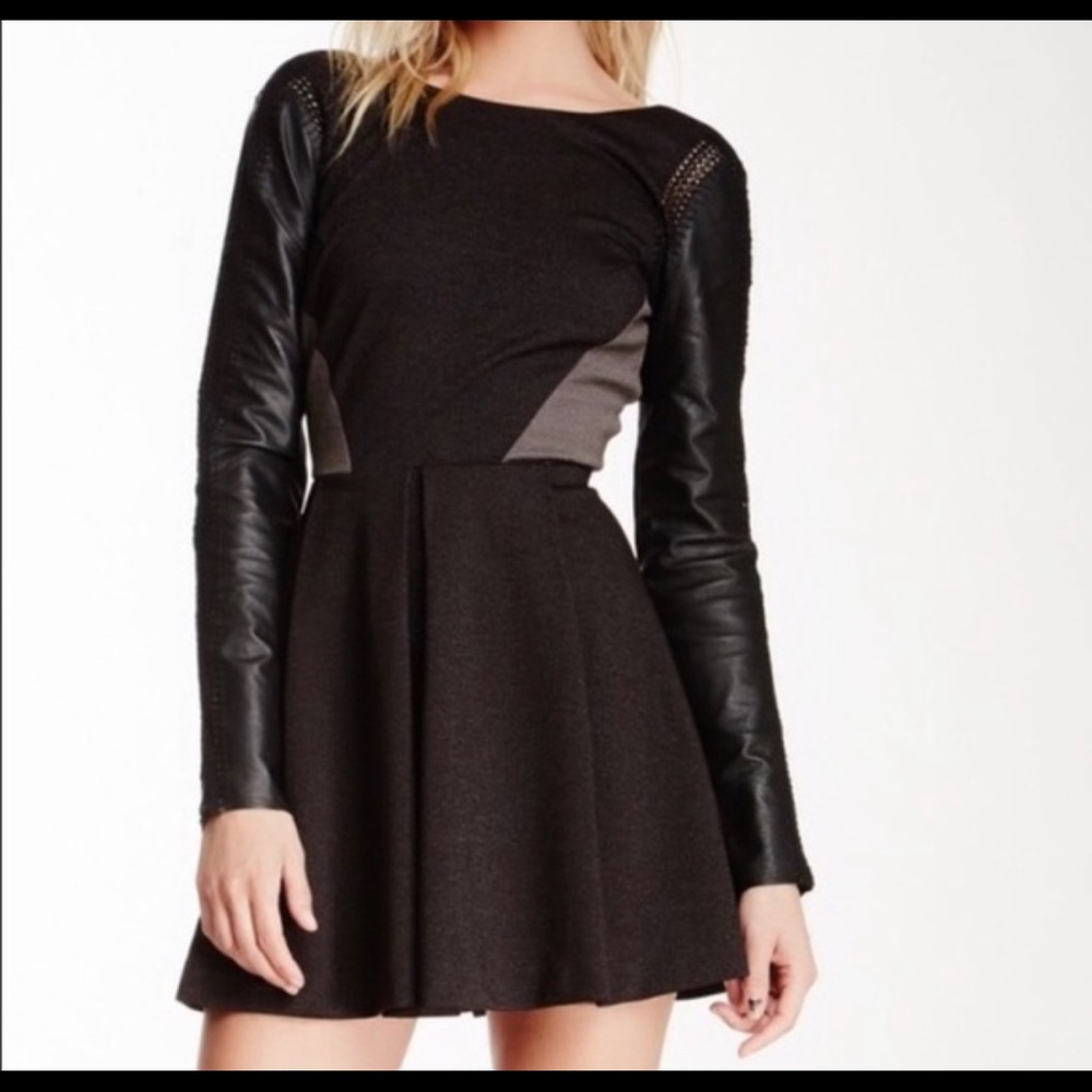 Sparkly mini dress with leather sleeves